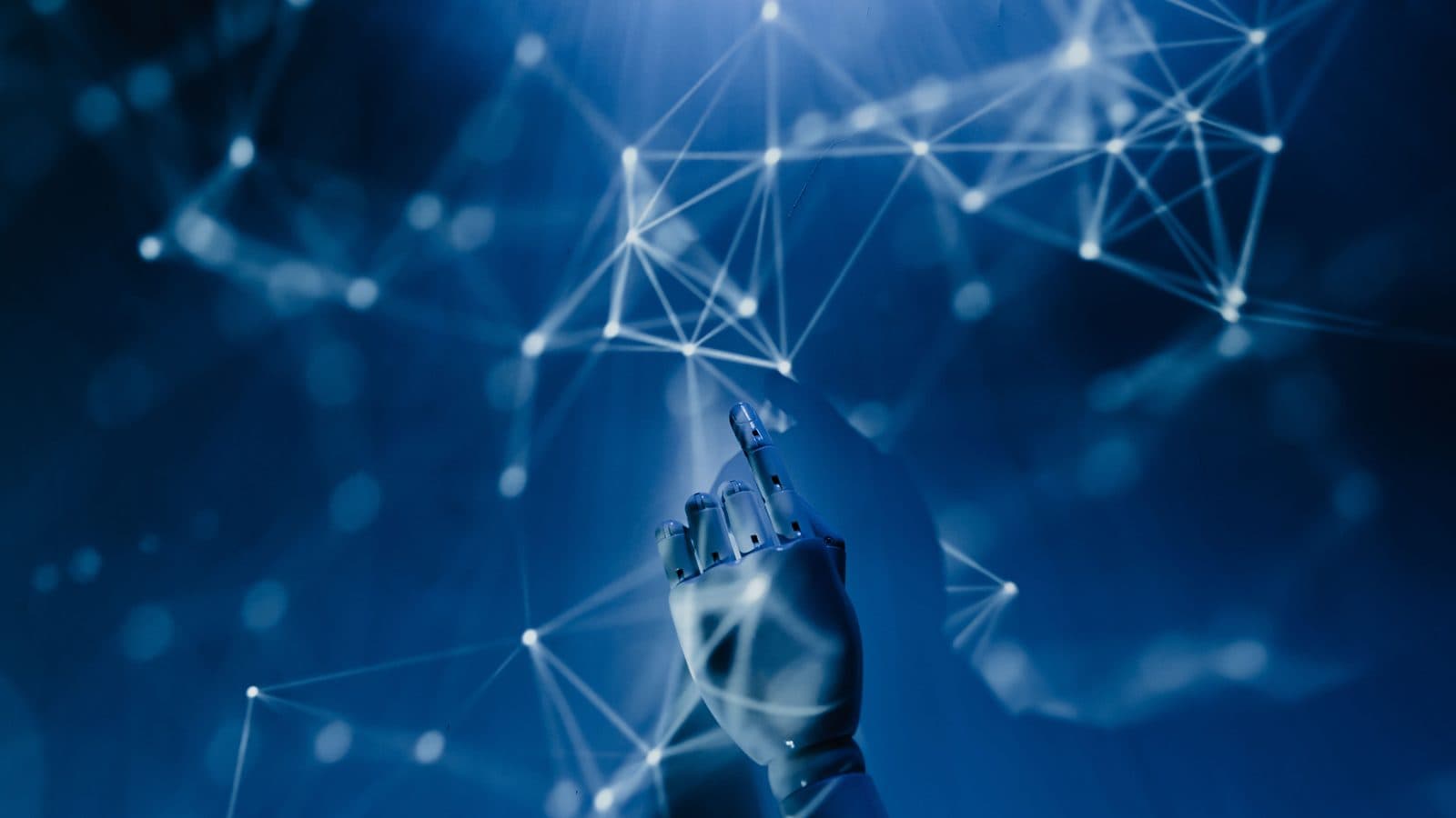 A robotic hand reaching into a glowing network of connected nodes, representing AI agents and automation
