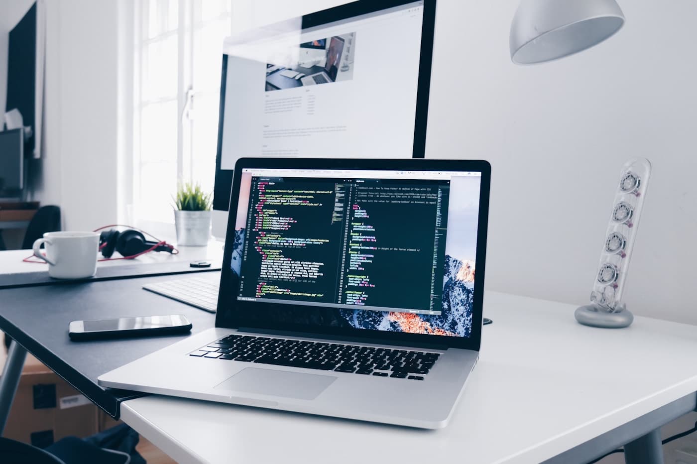 Developers pairing at workstations